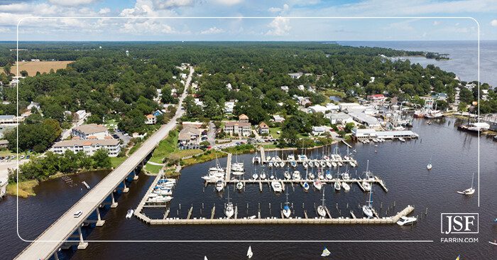 Boats in a marina near a bridge in the coastal town of New Bern, NC.